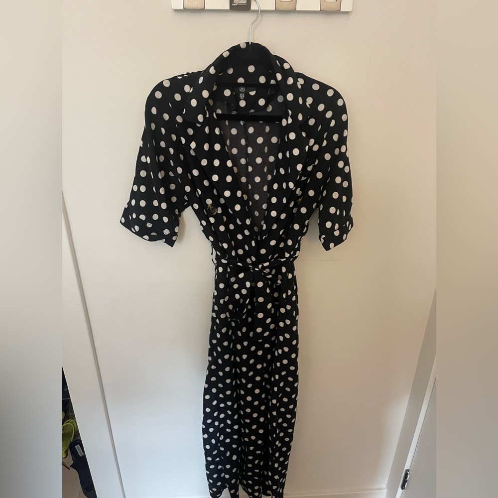 Black with white polka dot vintage style jumpsuit with tie waist belt.